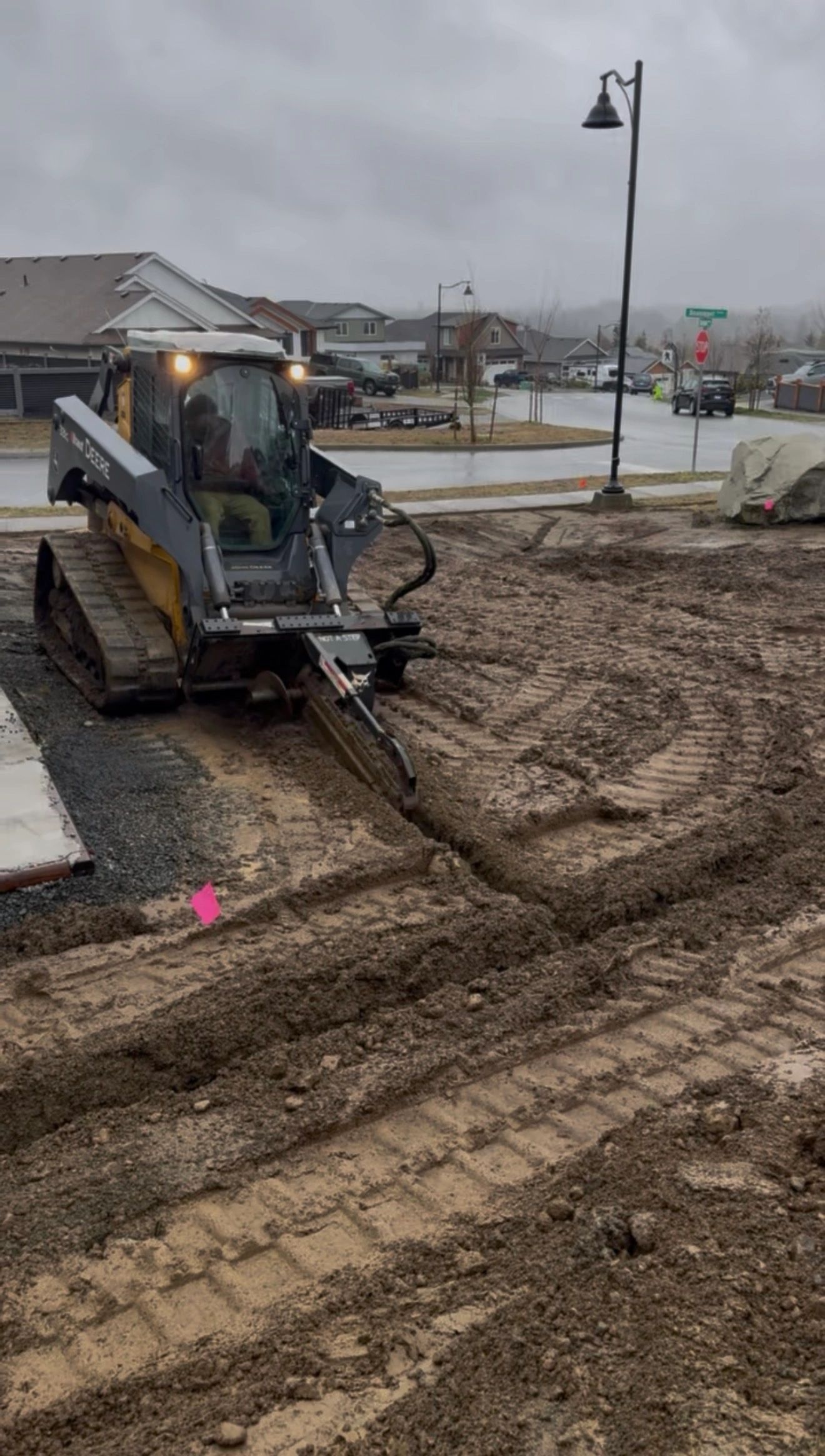 New sprinkler system installation with excavation equipment