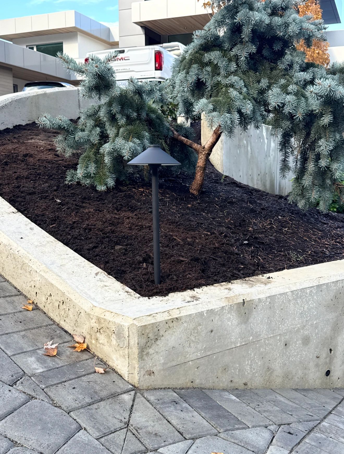 Professional landscape lighting installation on stone steps