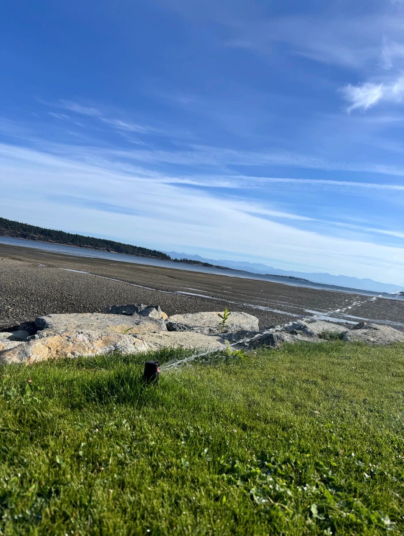 Irrigators technician performing spring irrigation start-up on Vancouver Island